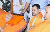 Union Minister Uma Bharathi meets Pejawar seer, enquires about his health